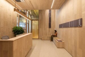 reception area rendered in textured fiber concrete planks